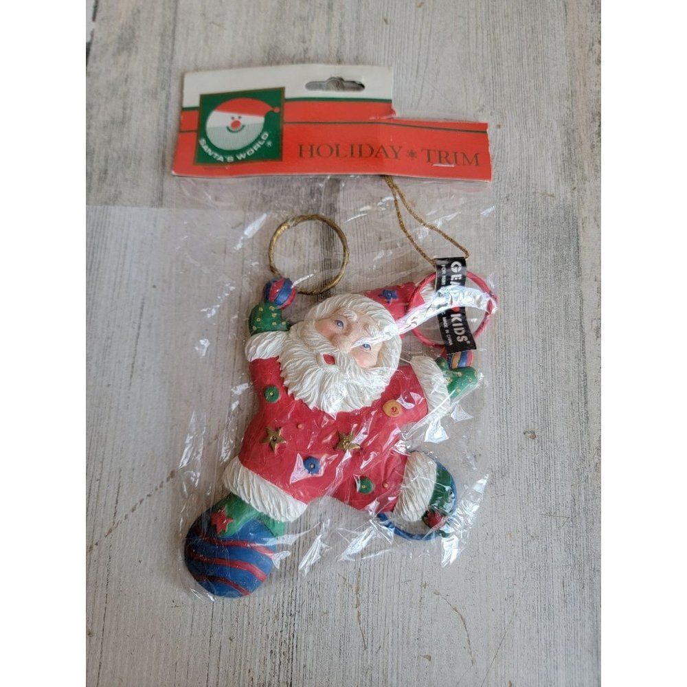 Vintage Kurt Adler Santa Claus circus ring toss ball balance unique ornament Xma